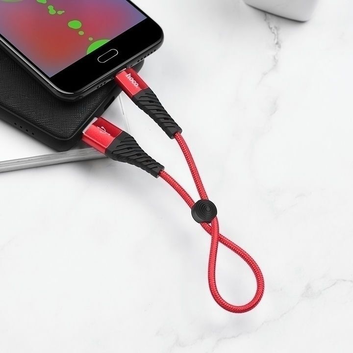  کابل تبدیل USB به Micro USB هوکو مدل X38 به طول 0.25 متر با رنگ قرمز، متصل به تلفن همراه 