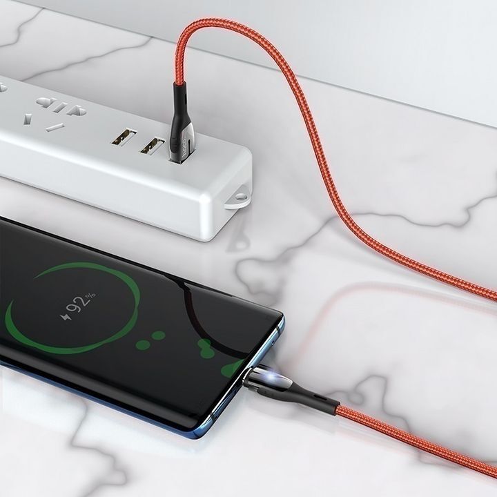 کابل تبدیل USB به Type-C هوکو مدل U89 با طول 1.2 متر، متصل به گوشی هوشمند و شارژر متصل به پریز برق