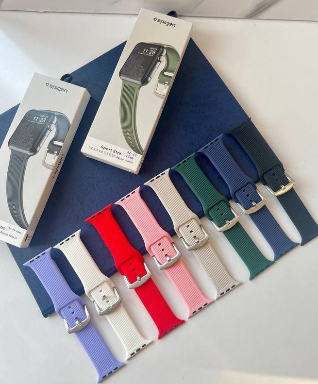  بند اپل واچ مدل Sport Straps با رنگ‌های متنوع شامل آبی، سبز، قرمز، سفید و صورتی، مناسب برای مدل‌های مختلف اپل واچ. 